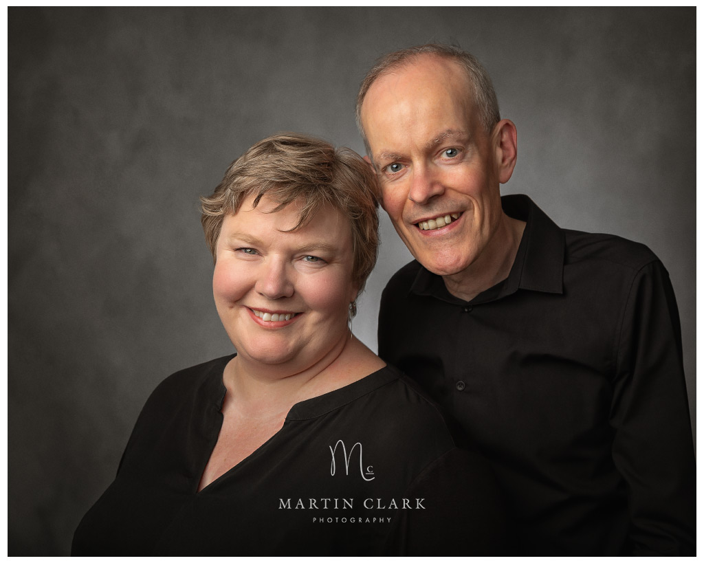 portrait of couple wearing black shirts_married
