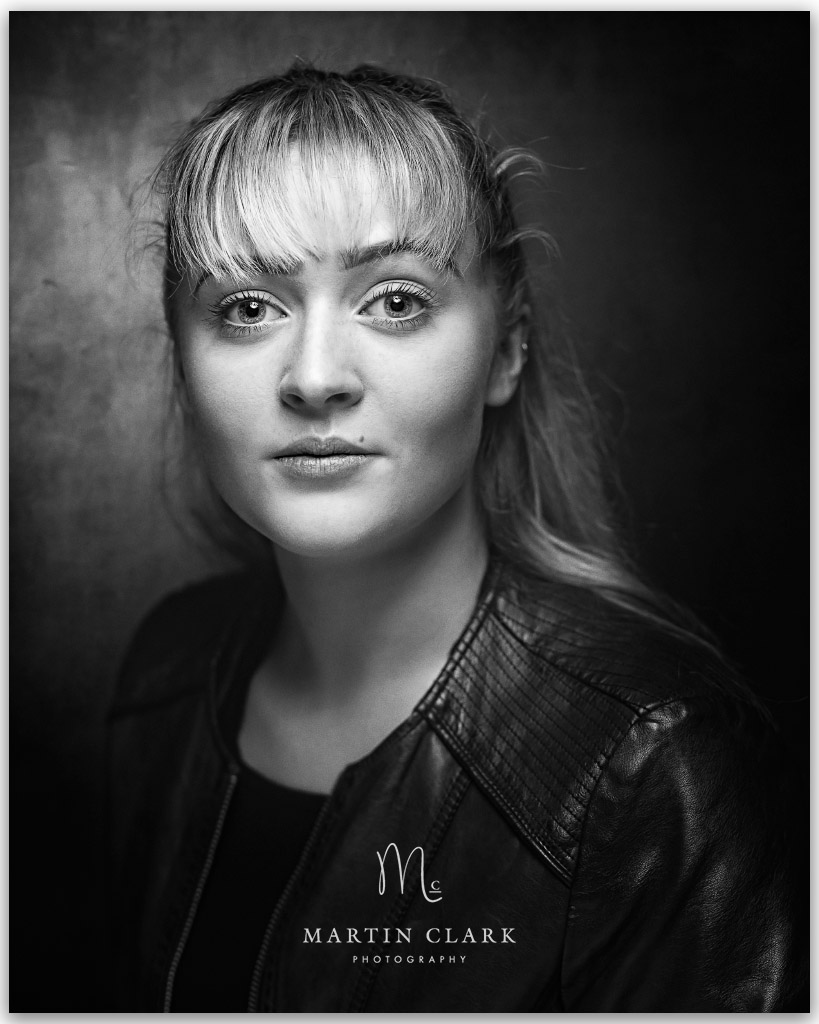 Portrait of young woman with red dress