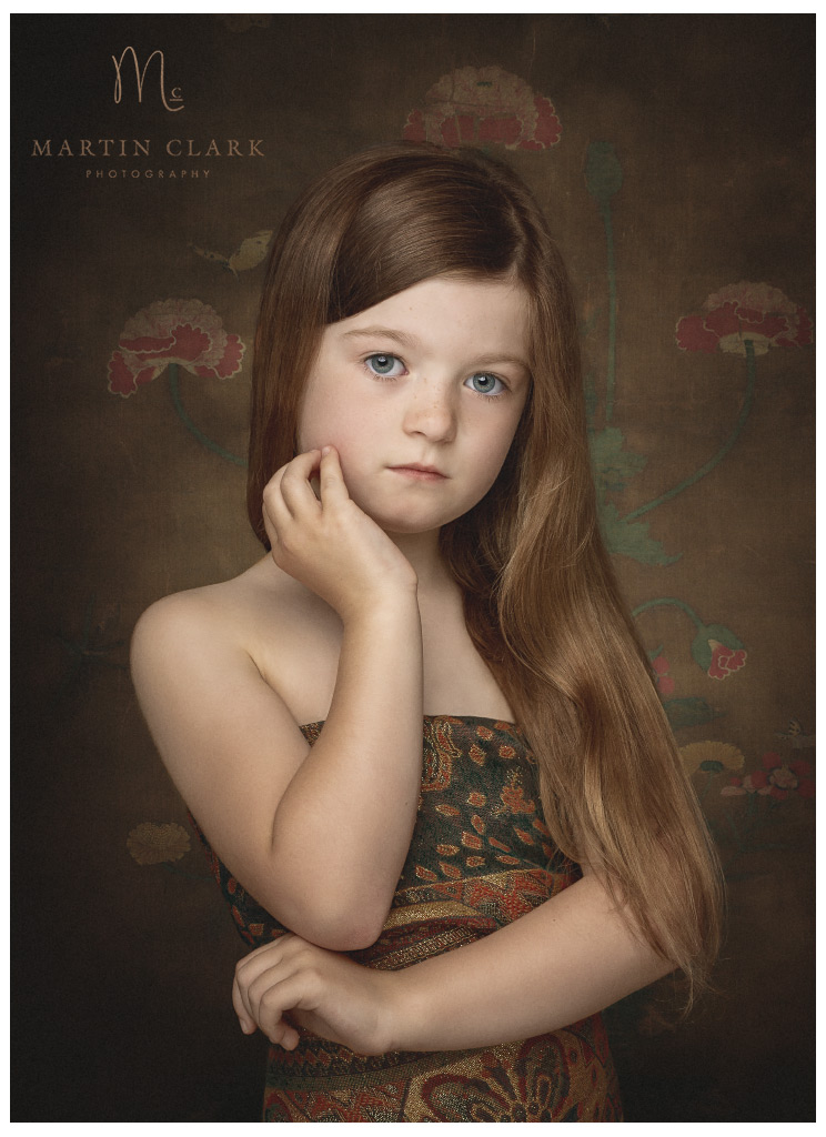 Portrait of young girl with floral background