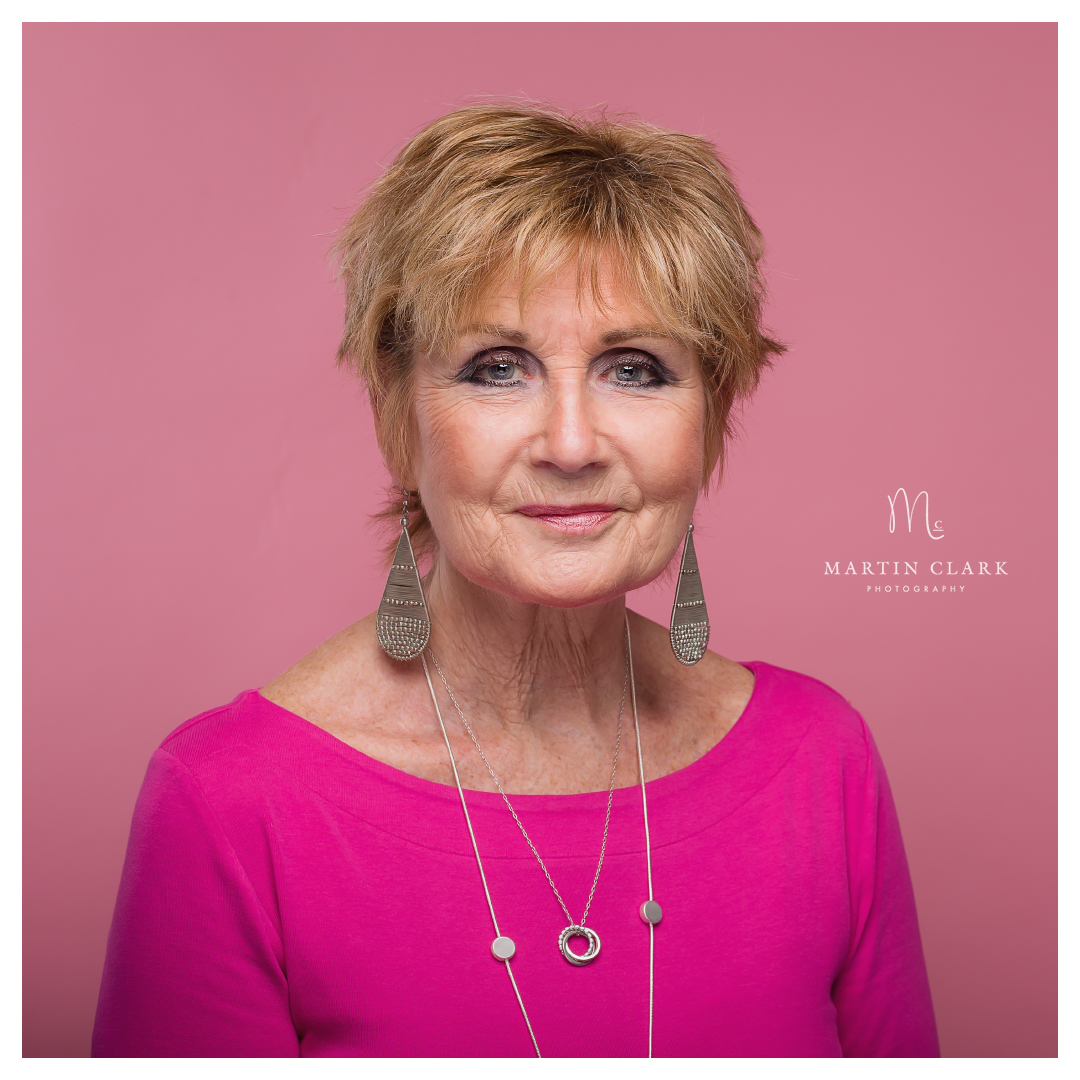 portrait of a lady with pink