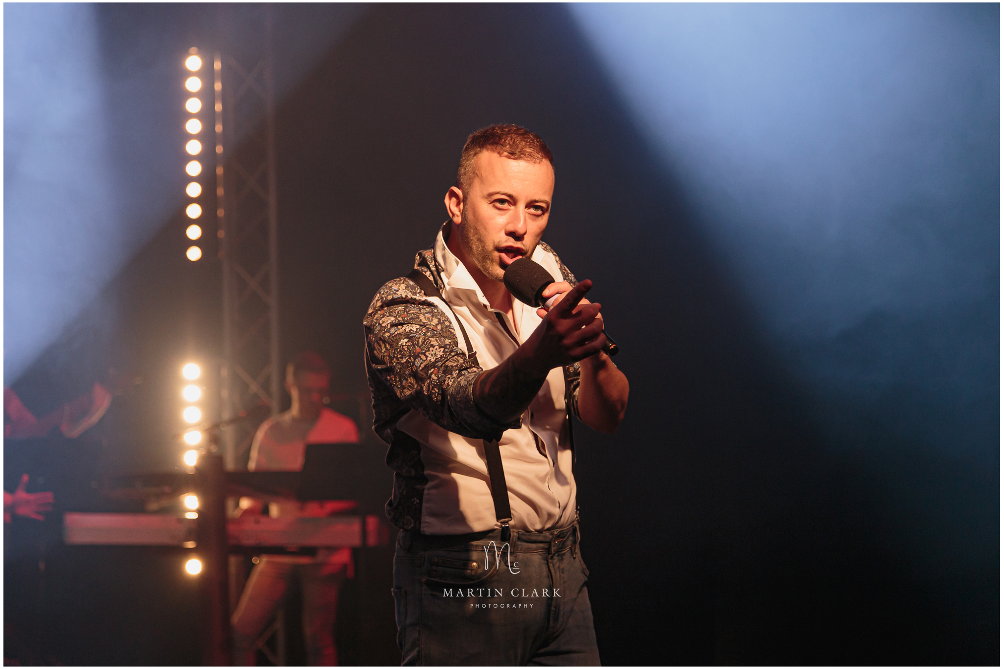 Singer performing at a concert