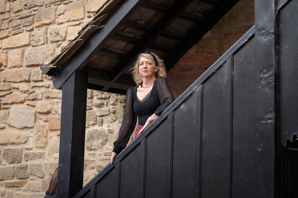 Actress from Theatre Alliance's cast during an outdoor musical theatre performance