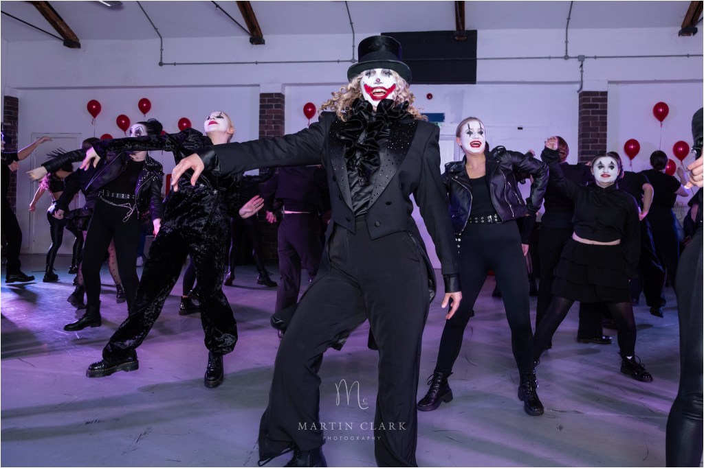 Happy clown dancer during performance