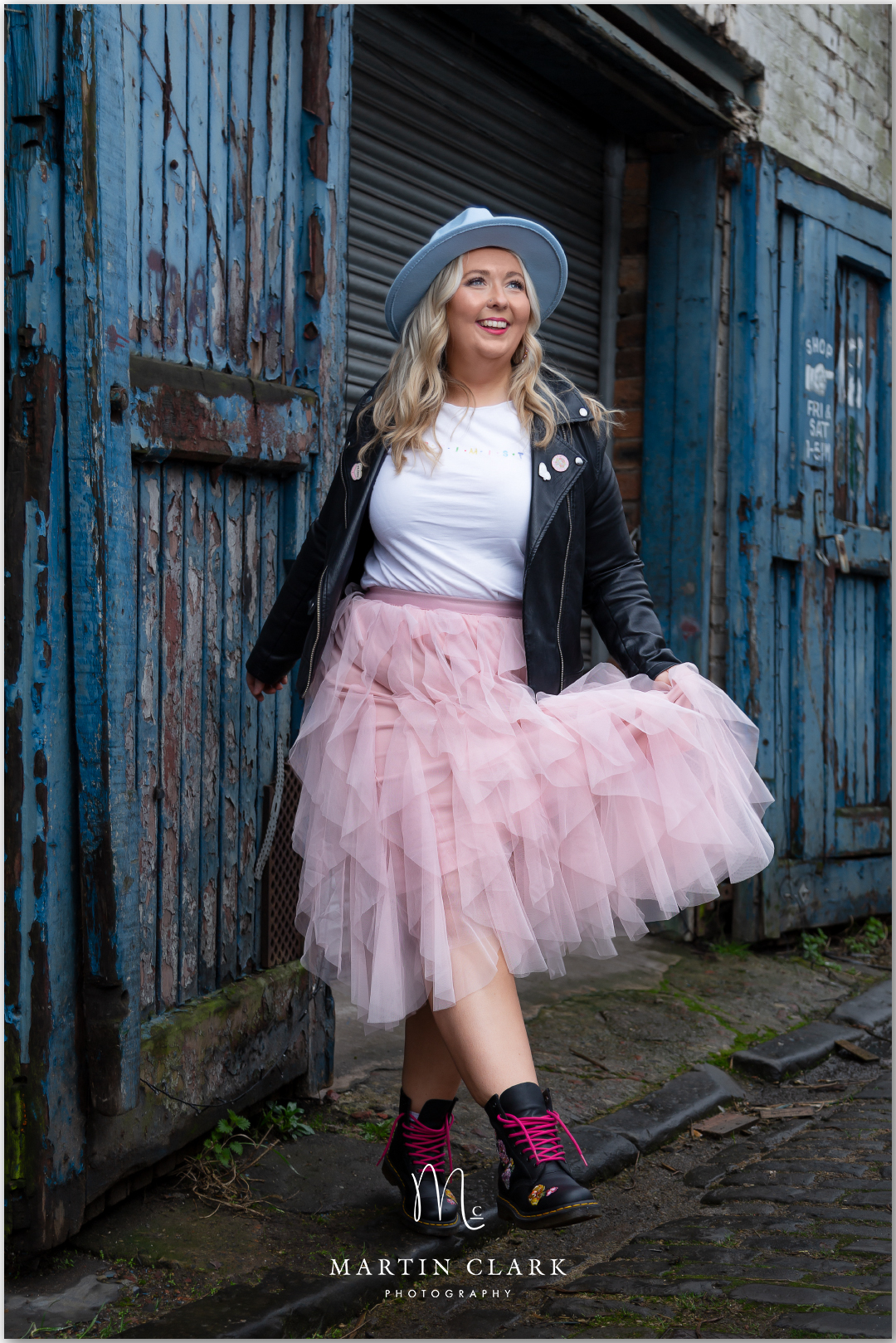 Happy girl in urban grungy setting